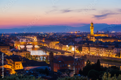 Fototapeta Naklejka Na Ścianę i Meble -  View of the river embankment of Arno and cathedrals of Florence from Michelangelo's hill on a sunset