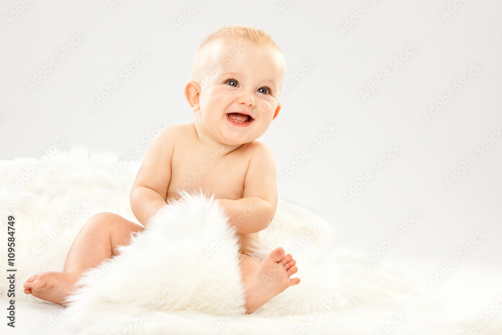 beautiful blonde hair blue eyes baby in a white room beautiful blonde hair blue eyes baby in a white room