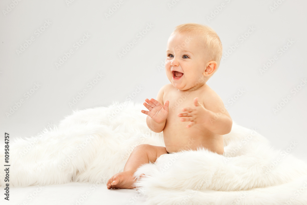 beautiful blonde hair blue eyes baby in a white room beautiful blonde hair blue eyes baby in a white room