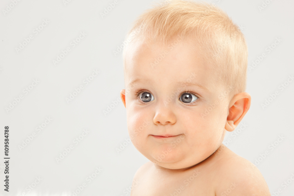 beautiful blonde hair blue eyes baby in a white room beautiful blonde hair blue eyes baby in a white room