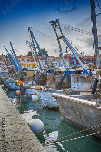 Dramatic view on fishing boats and ships in the Mediterranean harbor, HDR © perfectmatch