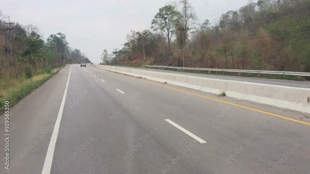time lapse driving a bar on a country road in day time - POV - Point of view front time lapse driving a bar on a country road in day time - POV - Point of view front
