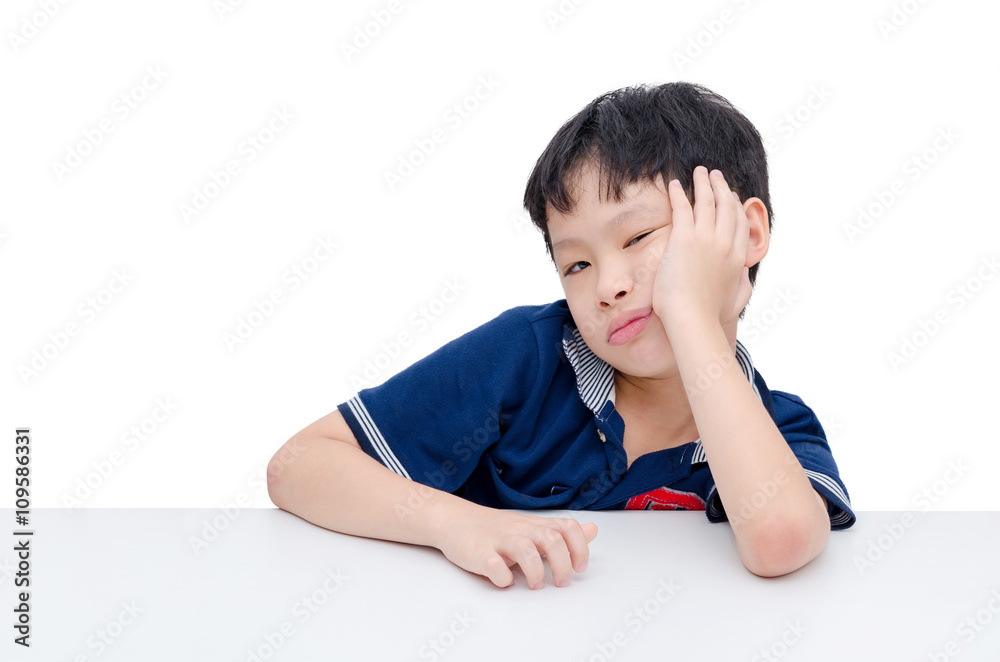 Boring Asian boy sitting over white background Boring Asian boy sitting over white background