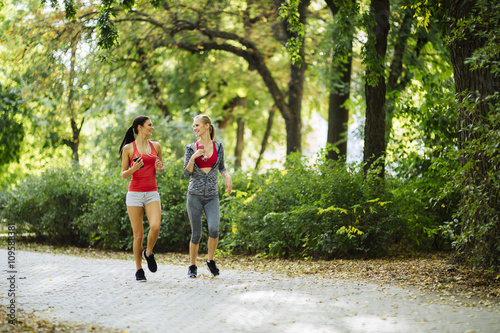 Beautiful sporty women jogging