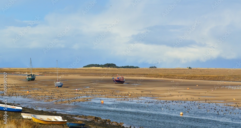 Boats moored on the North Norfolk coast. Boats moored on the North Norfolk coast.