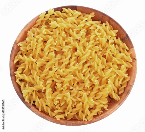 Spiral Pasta in bowl on white background