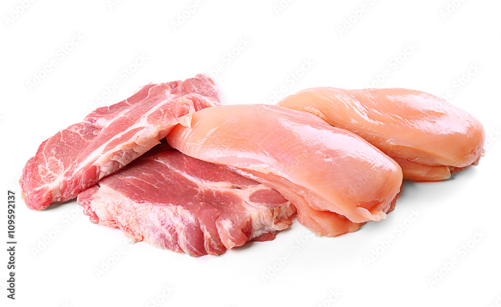 Pieces of pork and chicken meat, isolated on white Pieces of pork and chicken meat, isolated on white
