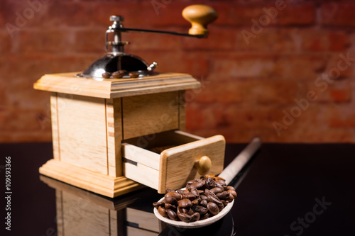 Wood Spoon with Roasted Coffee Beans and Grinder