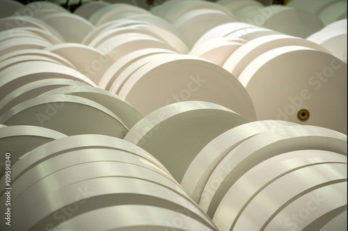 Industrial sized rolls of newspaper print