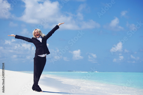 Business woman on beach