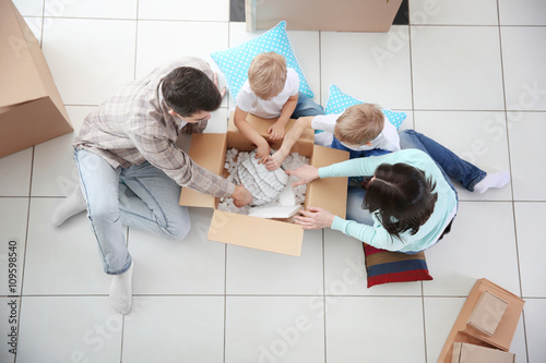 Moving concept. Happy famil...