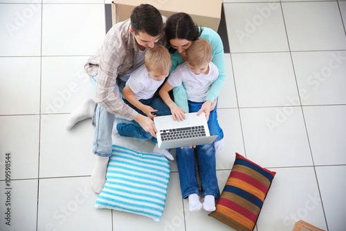 Moving concept. Happy famil...