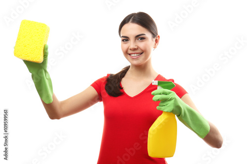 Young woman holding sponge ...
