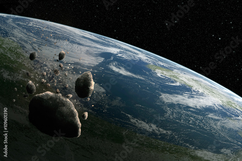 Cosmos scene with asteroid and planet Earth in space