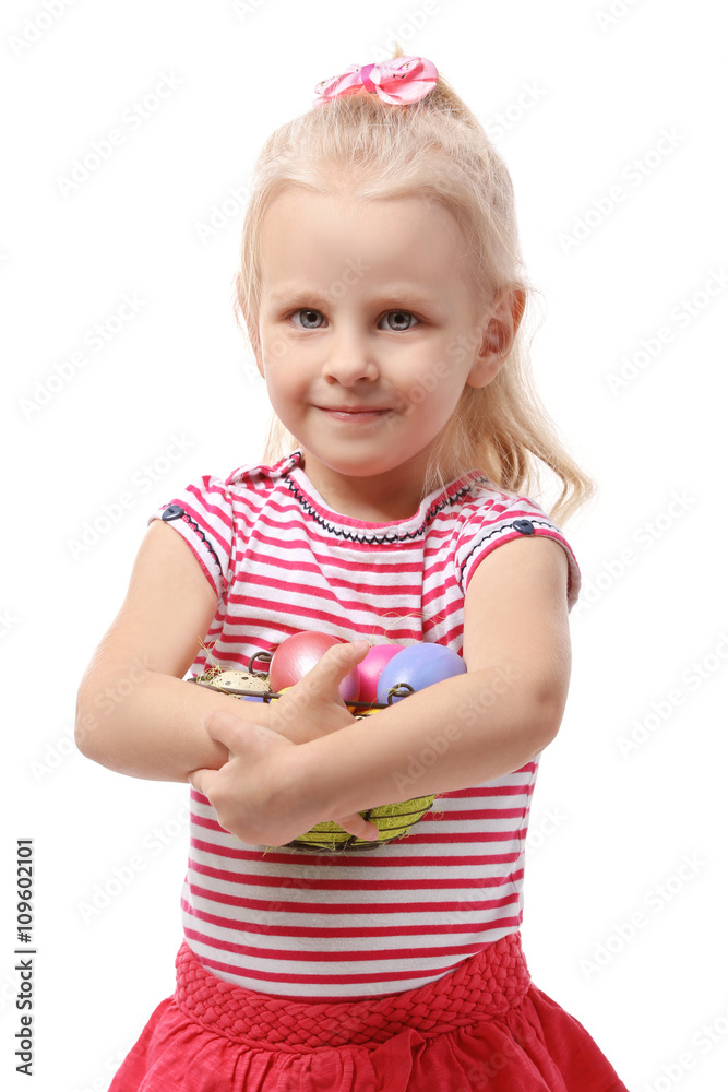 Little girl holding basket with Easter eggs isolated on white Little girl holding basket with Easter eggs isolated on white