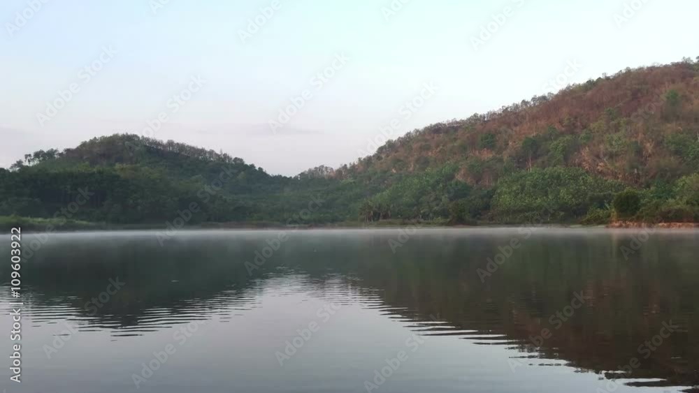 Beautiful time lapse of mountains clouds and a lake, Thailand
