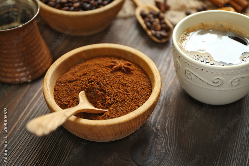 Coffee with beans and spices on wooden table closeup Coffee with beans and spices on wooden table closeup