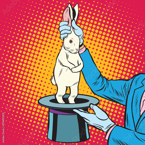 white rabbit in the magicians hands