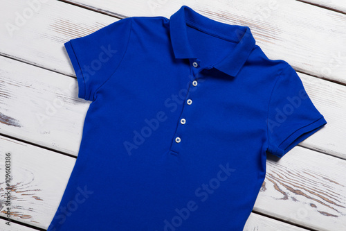 Casual blue polo t-shirt.