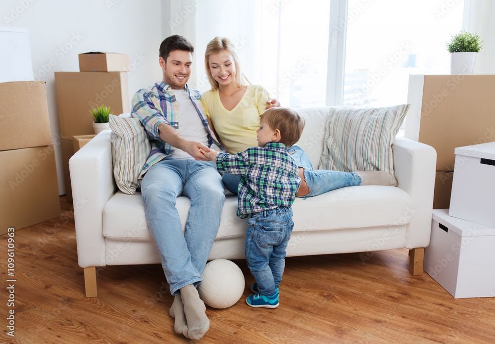 happy family moving to new home and playing ball happy family moving to new home and playing ball
