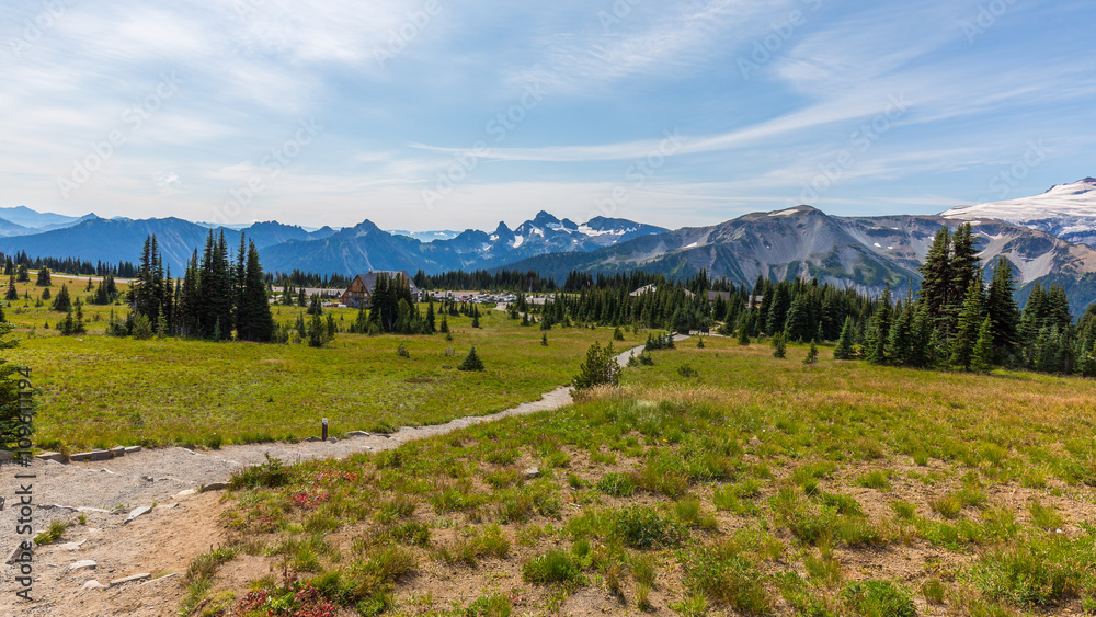 Summer landscape in mountains. Rocky mountains that propped up the sky. BERKELEY PARK TRAIL, Sunrise Area, Mount Rainier National Park Summer landscape in mountains. Rocky mountains that propped up the sky. BERKELEY PARK TRAIL, Sunrise Area, Mount Rainier National Park