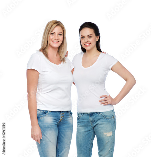 group of happy different women in white t-shirts