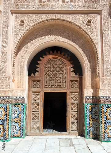 Door in the Ben Youssef madrasa in Marrakech, Morocco