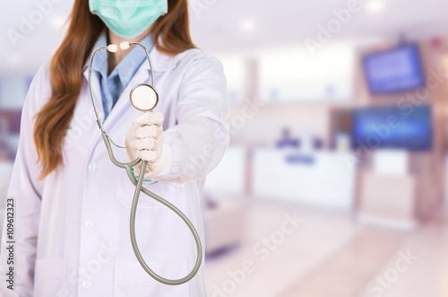 Female doctor with mask and stethoscope