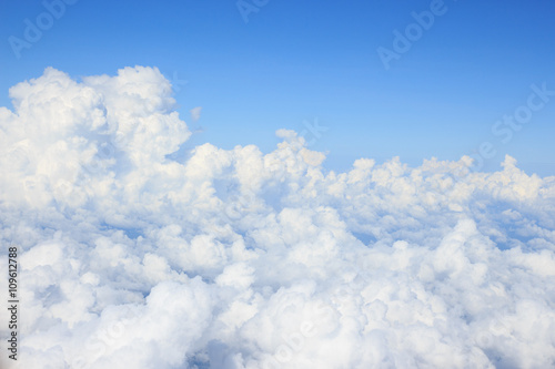 white cumulus clould and cloudscape on blue sky horizon background