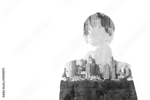 Double exposure concept portrait of asian businesswoman with city in the background