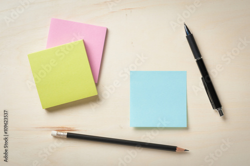 Sticky paper on wood desk