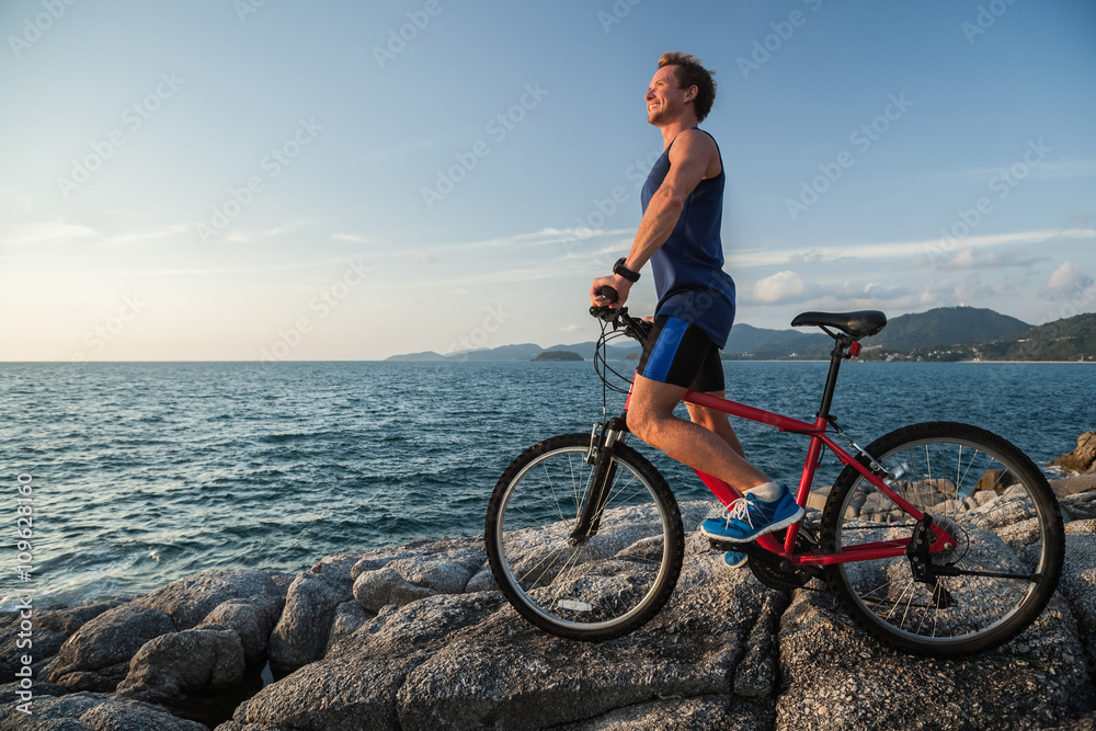 Obraz premium Man with bicycle