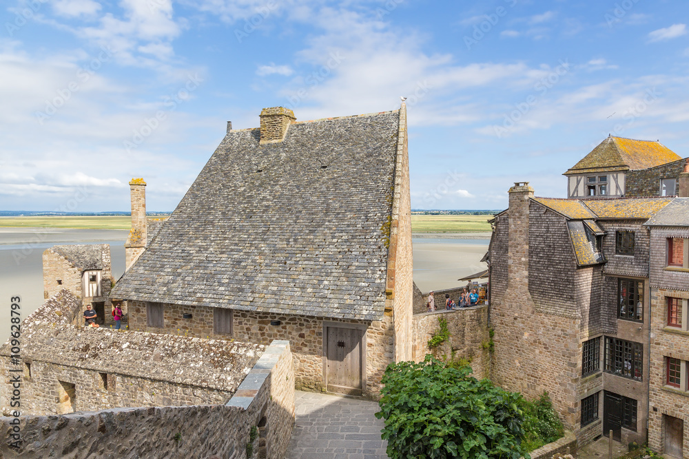 Mont-St-Michel, France. Ancient building of the abbey behind the ramparts