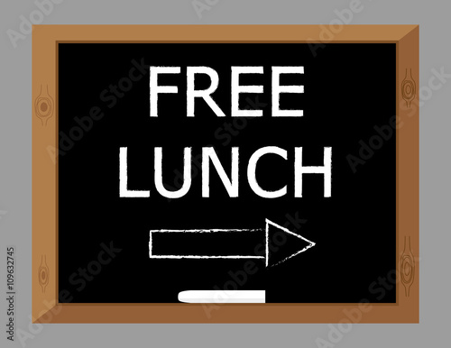 The words Free Lunch written in white text on a blackboard with an arrow pointing this way
