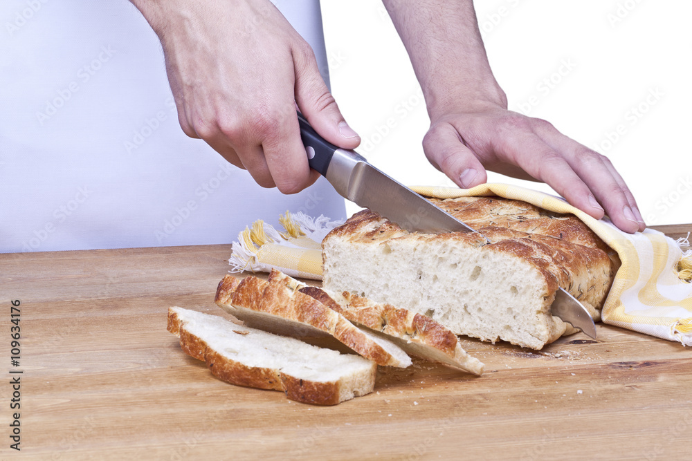 a baker cutting the bread