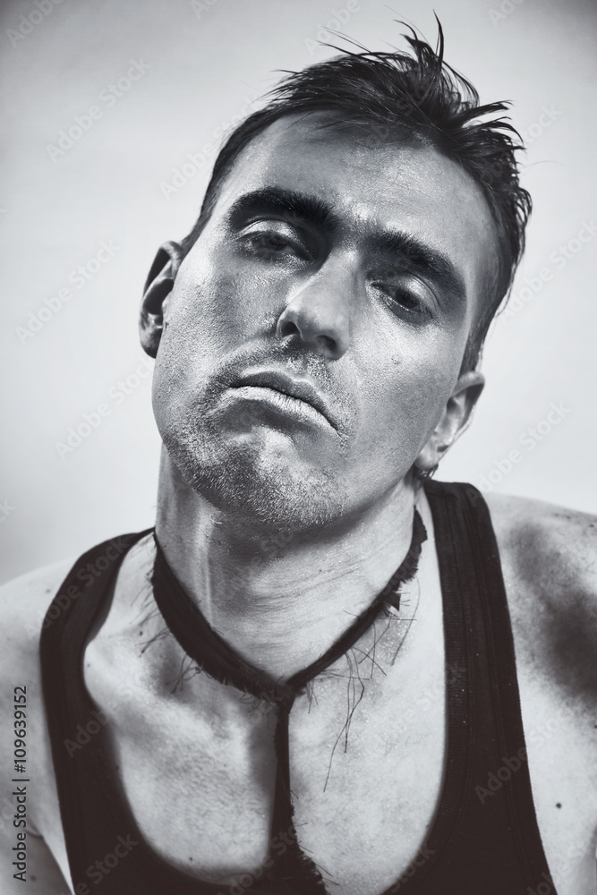 Obraz premium Portrait of a young man with a metallic makeup