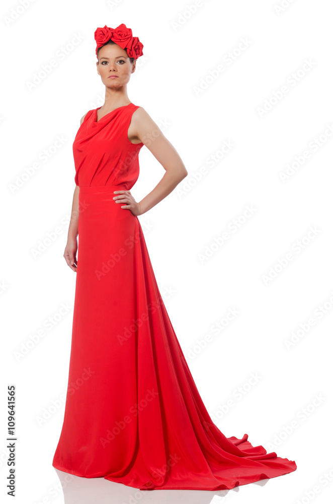 Pretty caucasian model in red long evening dress isolated on whi Pretty caucasian model in red long evening dress isolated on whi