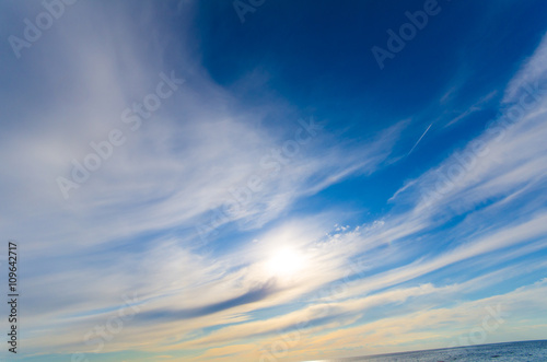 Sunny day on sea. Beautifull clouds. Blank space. Perfect diagonal background.