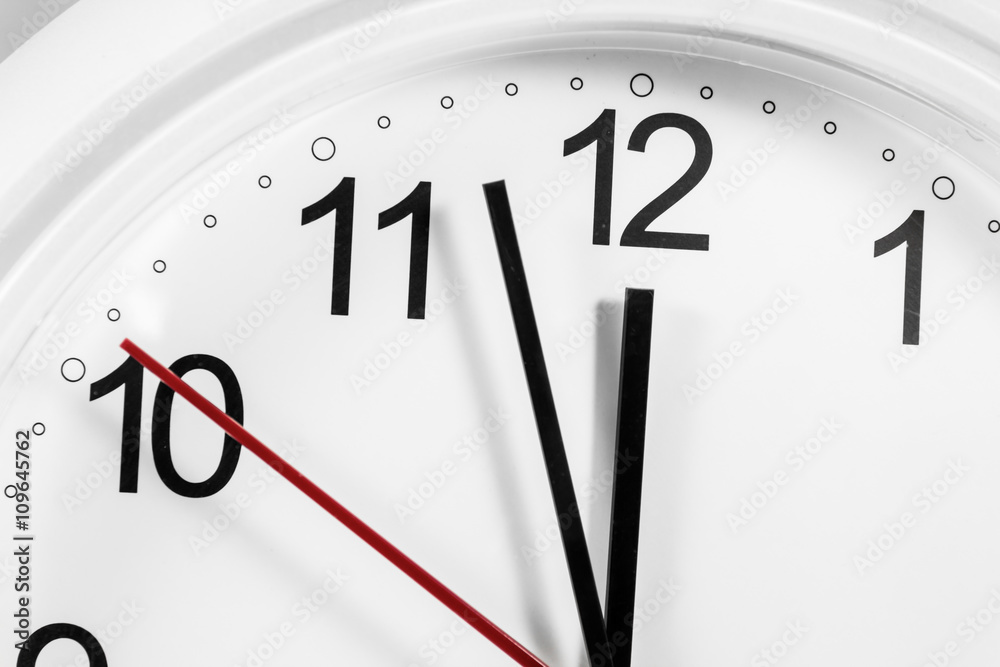 Closeup of hands on clock face.sensitive focus Closeup of hands on clock face.sensitive focus