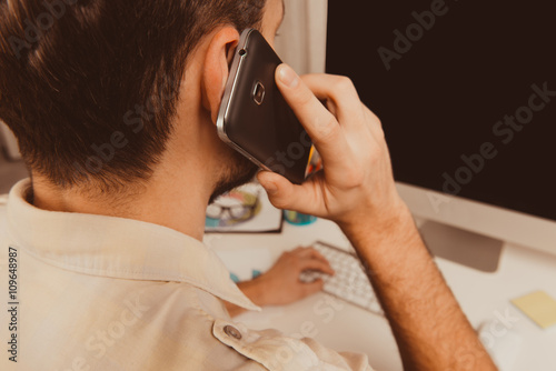 Close up photo of successful businessman having conversation wit photo