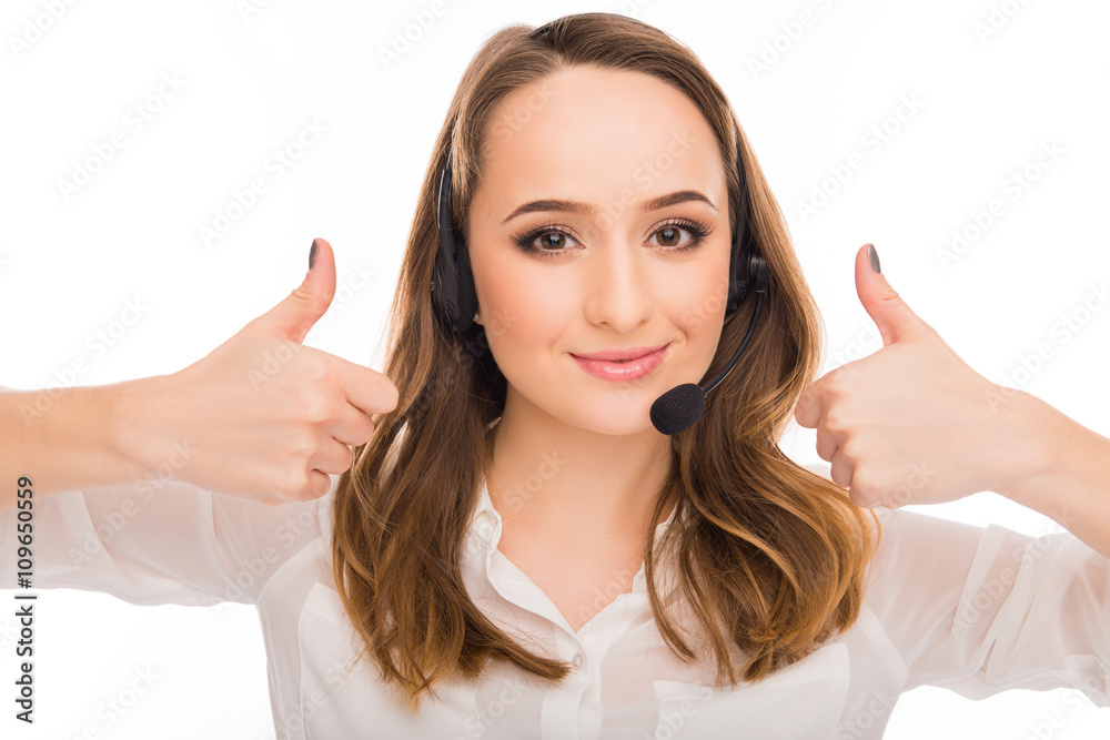 Smiling young agent of call centre gesturing Smiling young agent of call centre gesturing