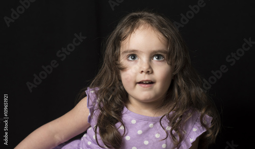 Adorable Dark Haired Little Girl in Studio