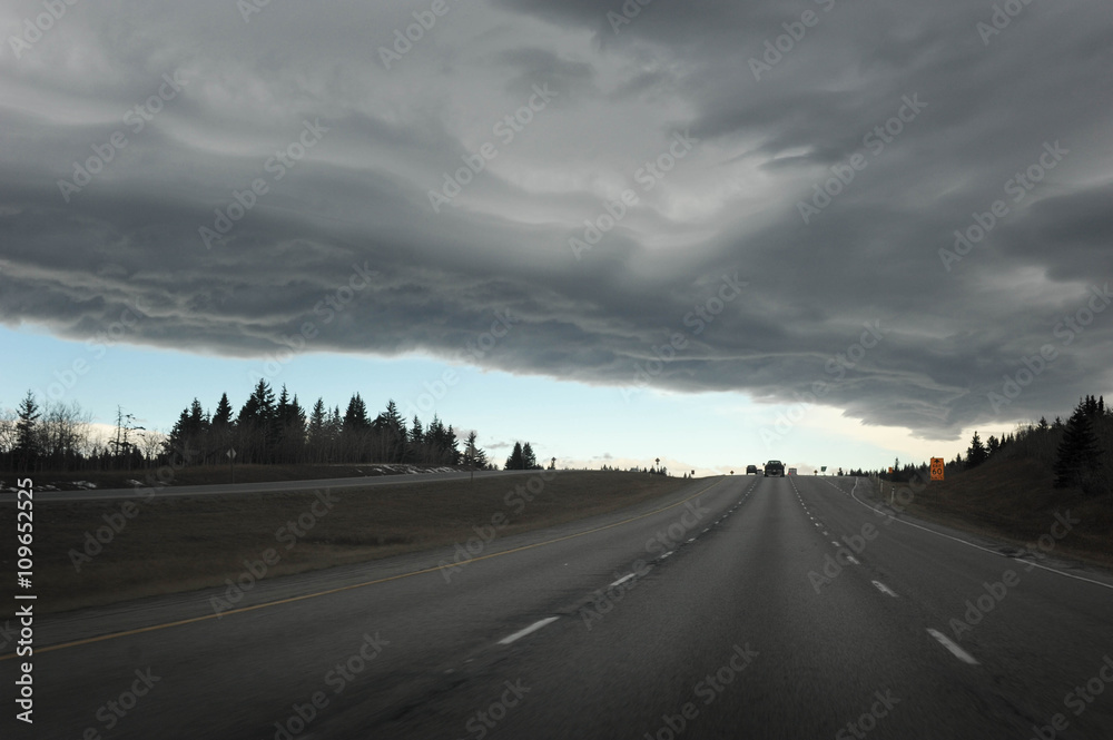Storm over Highway in the Rocky Mountains