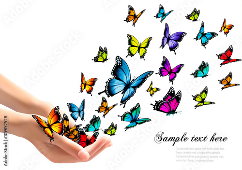 Hands releasing colorful butterflies. Vector illustration