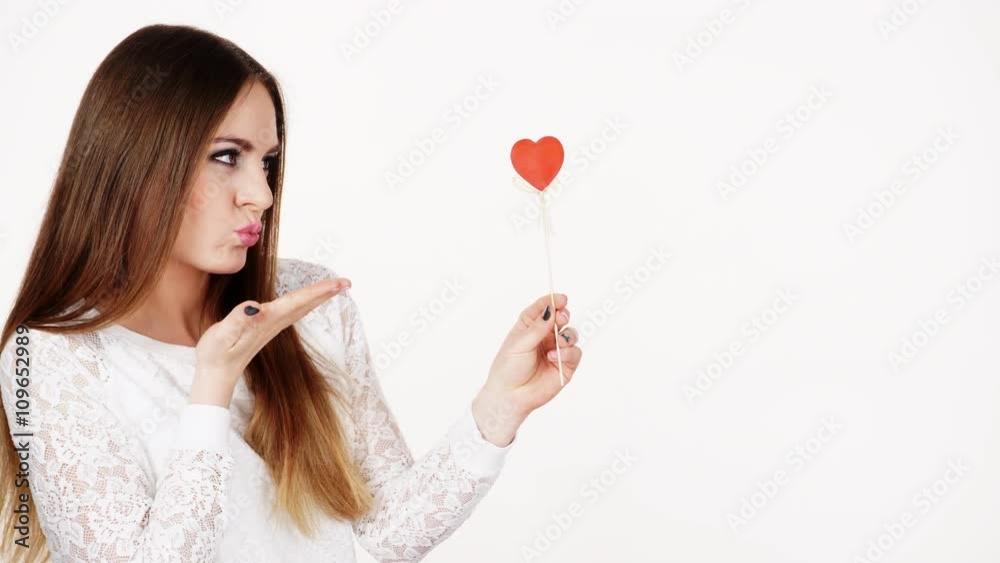 Woman attractive girl holding red heart love symbol 4K Woman attractive girl holding red heart love symbol 4K