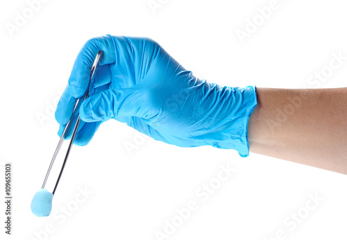 Doctors hand holding medical equipment.