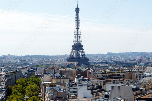 Color DSLR wide angle stock image of the landmark, tourist destination Eiffel Tower, Paris, France, with the city skyline in the foreground and background. Horizontal with copy space for text

