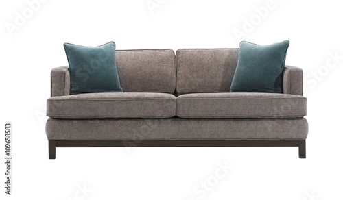 Grey sofa and blue pillows isolated with clipping mask.
