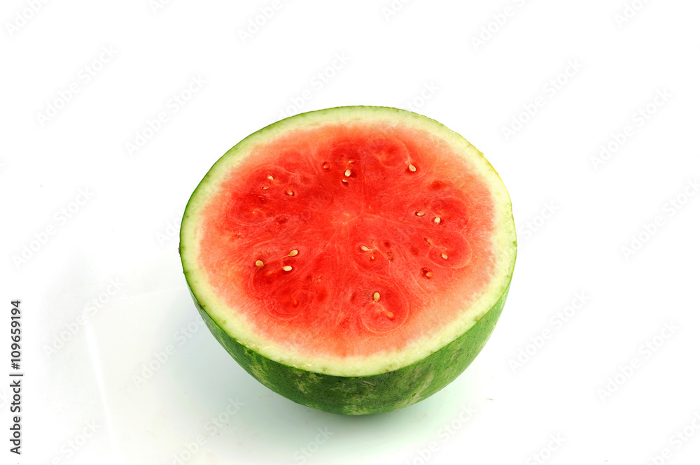 seedless watermelon cut in half on white background seedless watermelon cut in half on white background