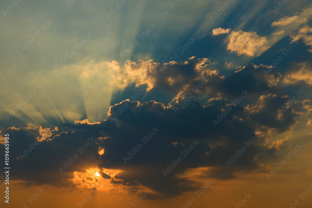 Beautiful sky with clouds and sun rays at sunset